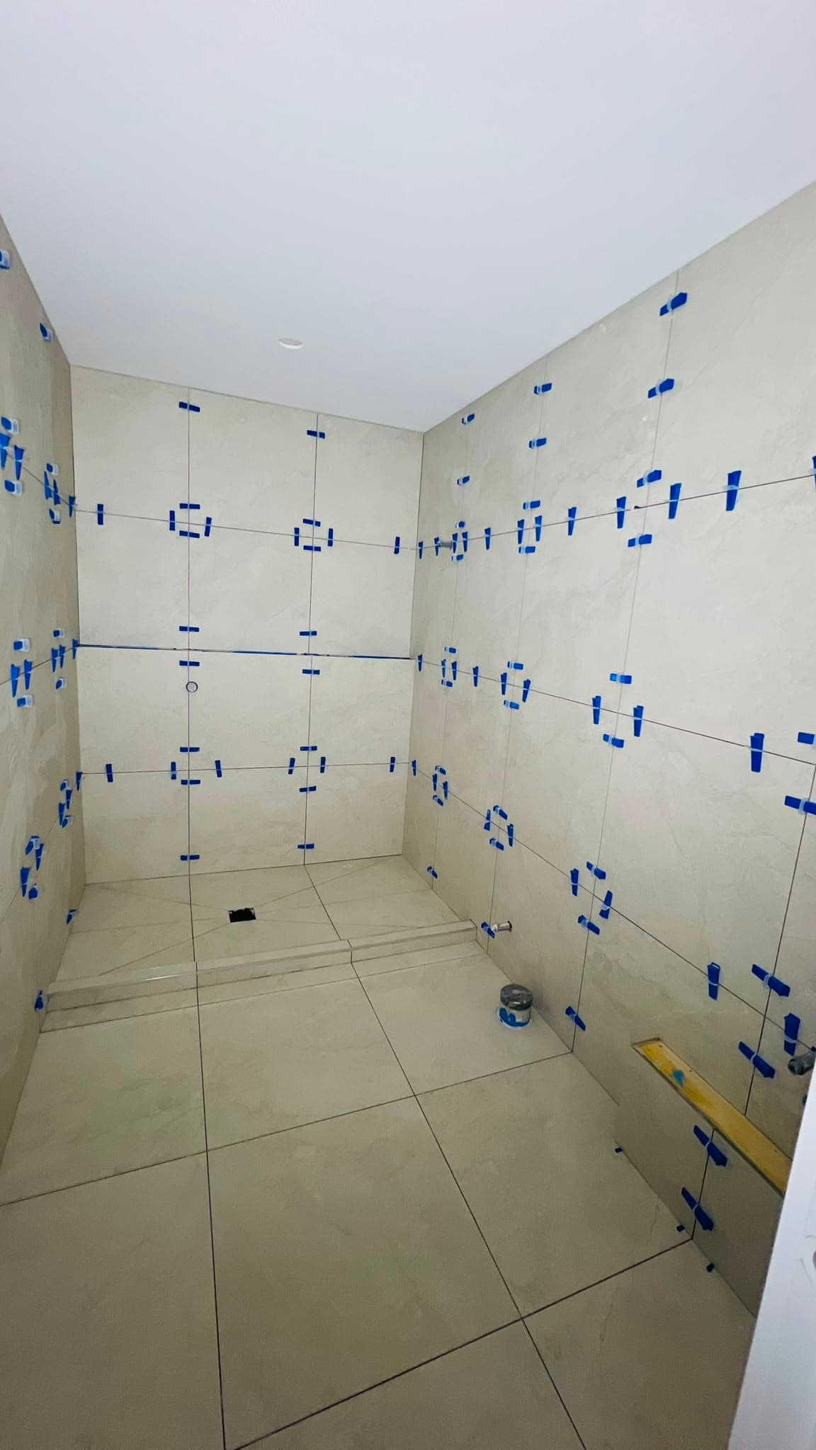 Tiler cutting tile